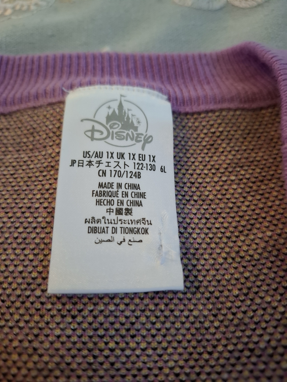 Disney Lilac Daisy Duck Crewneck Sweater with Pink Bow & Yellow Accents - Picture 6 of 13